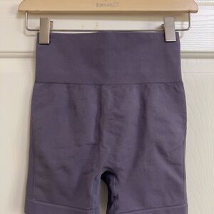 Purple high waisted booty enhancing biker shorts